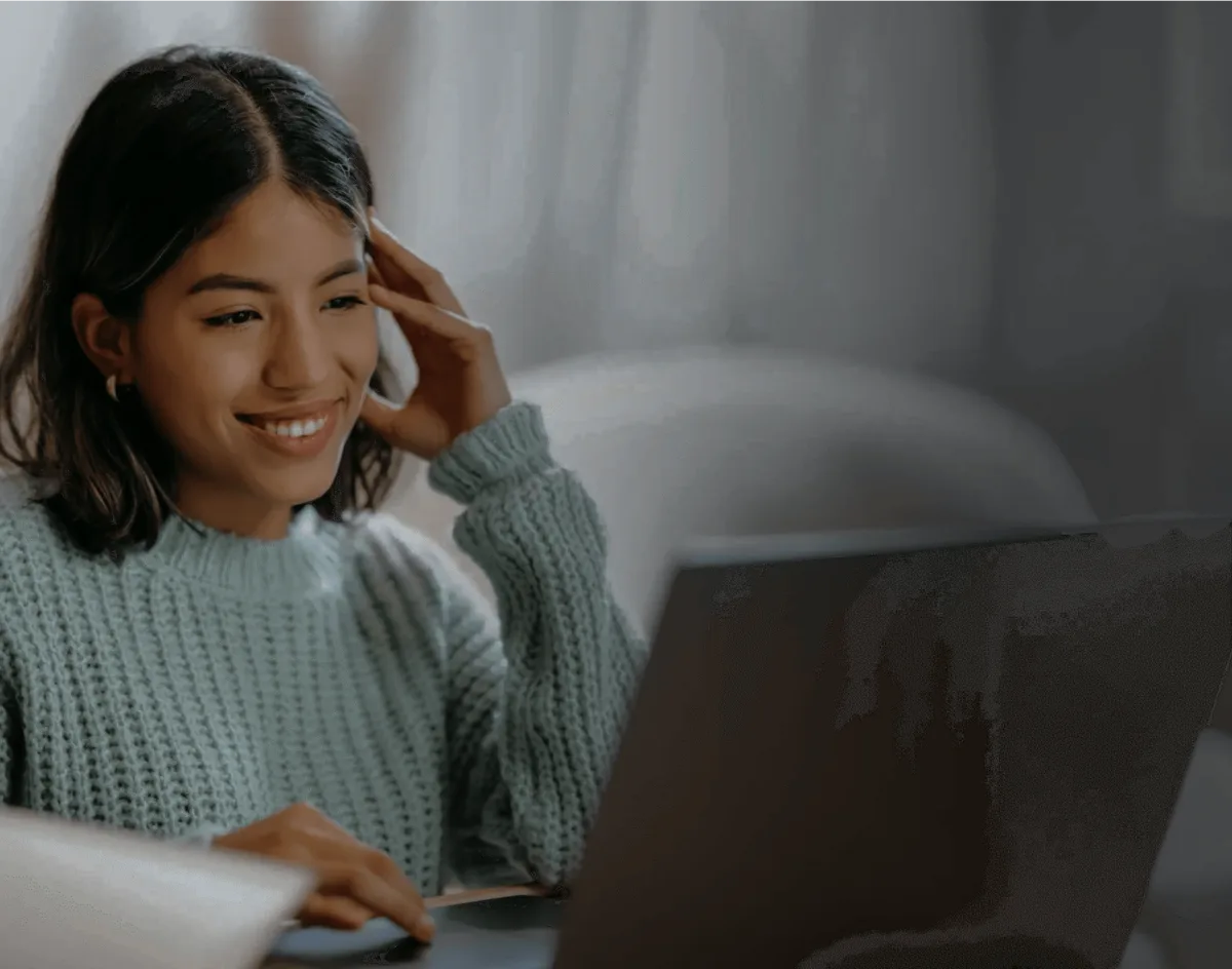 Woman livingroom laptop